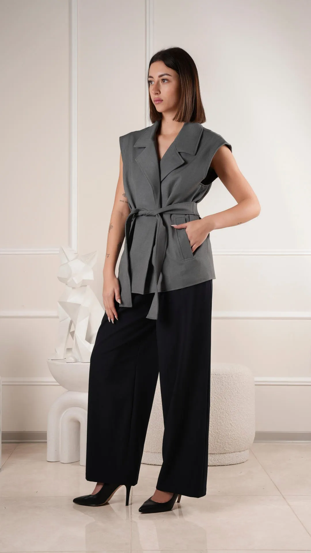 Sophisticated sleeveless blazer top with waist belt wholesale